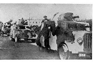 [Photo 4] No. 4, 5 Armoured Cars - 1940-41 (In 1940-41 four new armoured chariots were added to the, now, Armour Platoon. Each vehicle had a Bedford chassis with twin Vickers mounted in a single turret.)