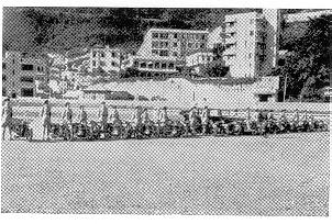 [Photo 5] M.M.G. Platoon, part of the Mobile Column, with Vickers mounted in motor-cycle combinations. 